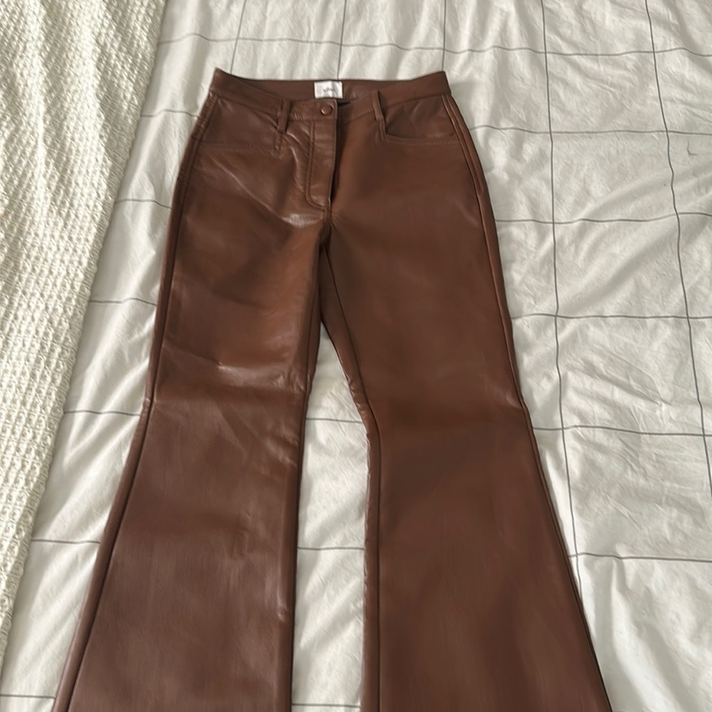 Never worn Aritzia faux leather pants in cognac color